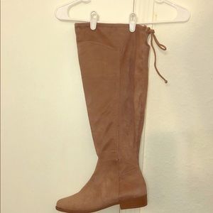 “Rose Cloud” thigh high boots.